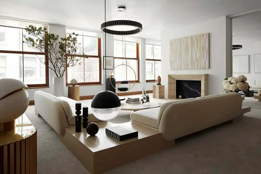 living room decor with rounded furniture and sculptural lighting