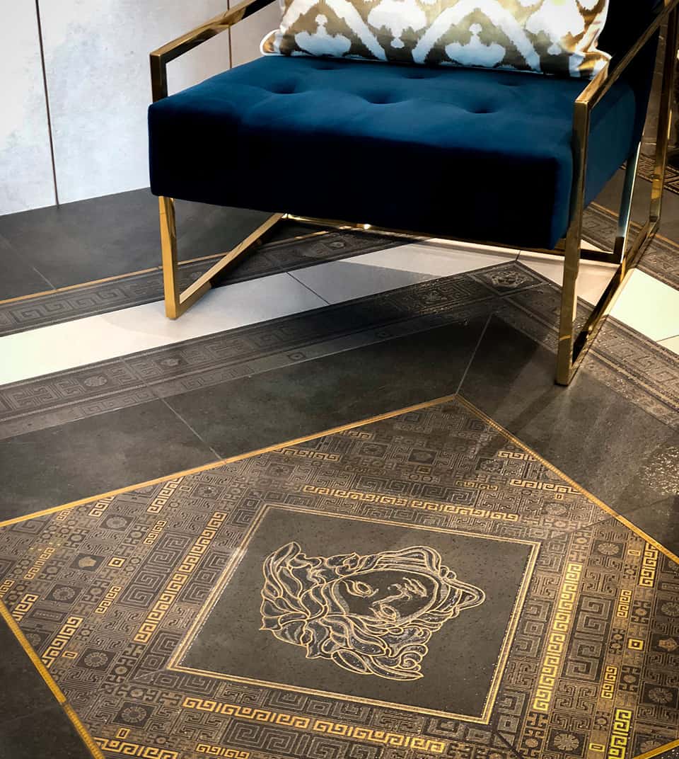 designer tiles in gold and marble design by Versace collection