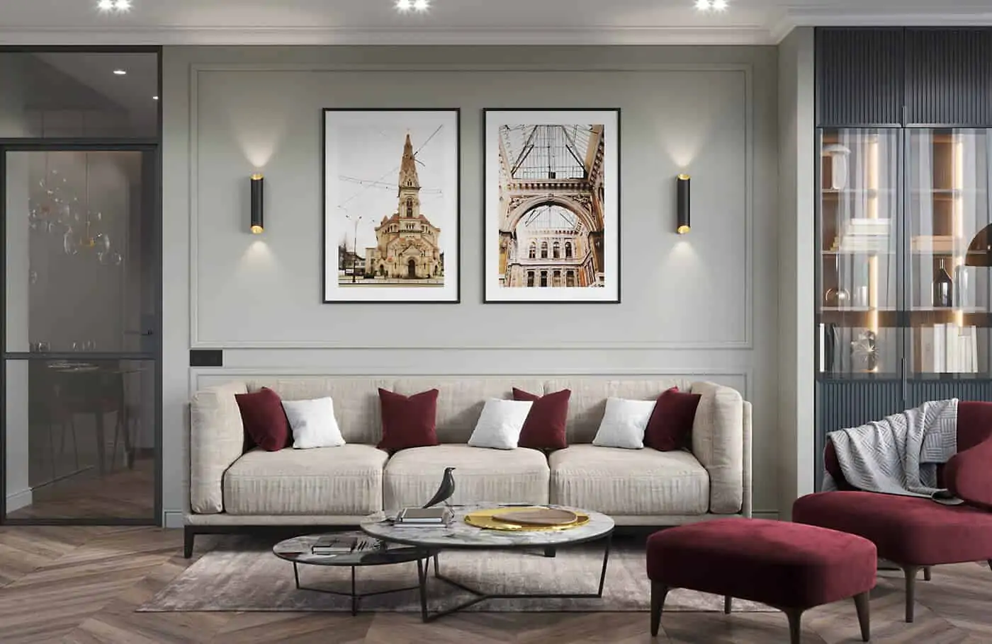 grey sofa with white and maroon cushions in living room with sconces on wall