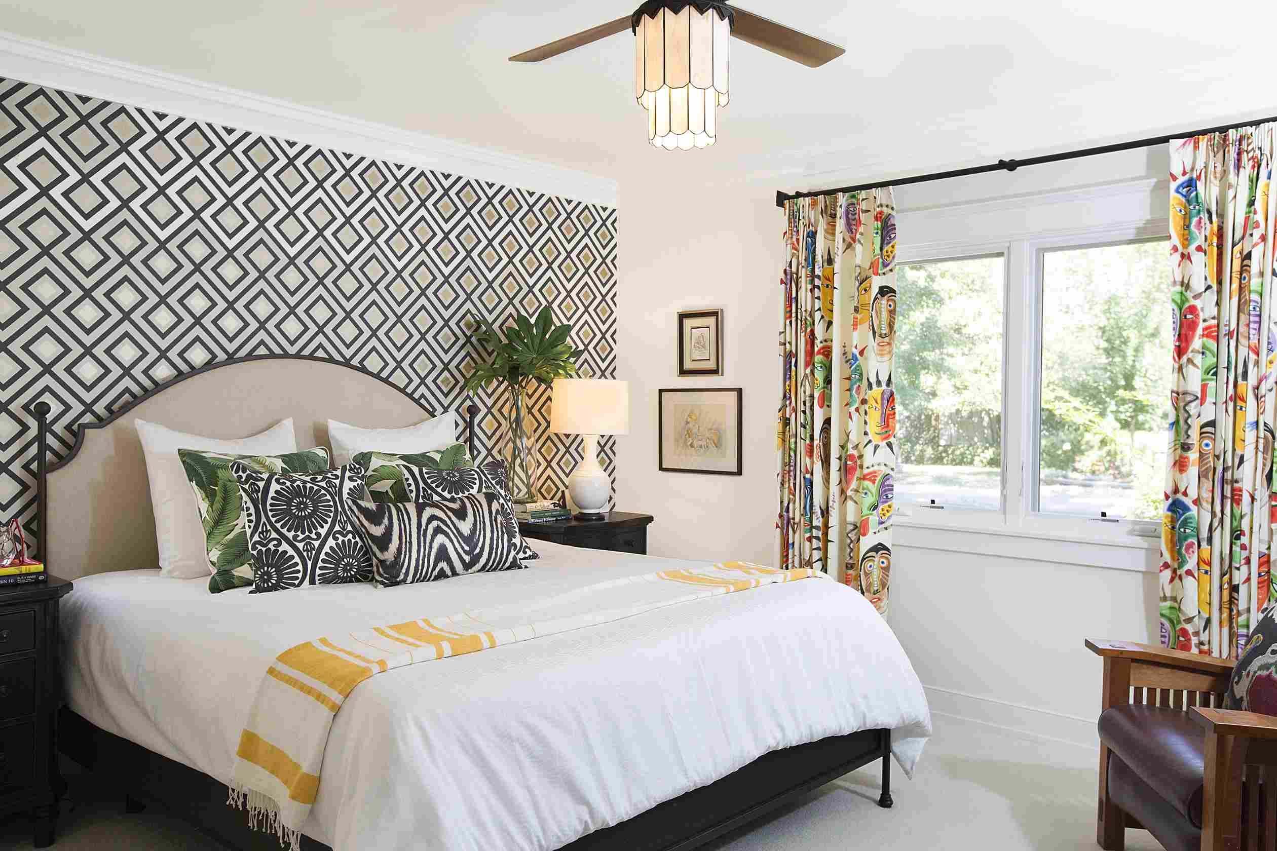 bedroom wall design with geometric monochrome wallpaper