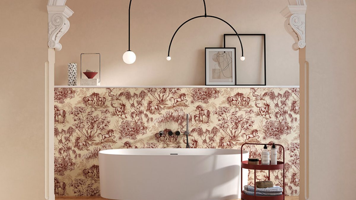 beige bath space with floral wall tiles with bathtub, pendant lights and table
