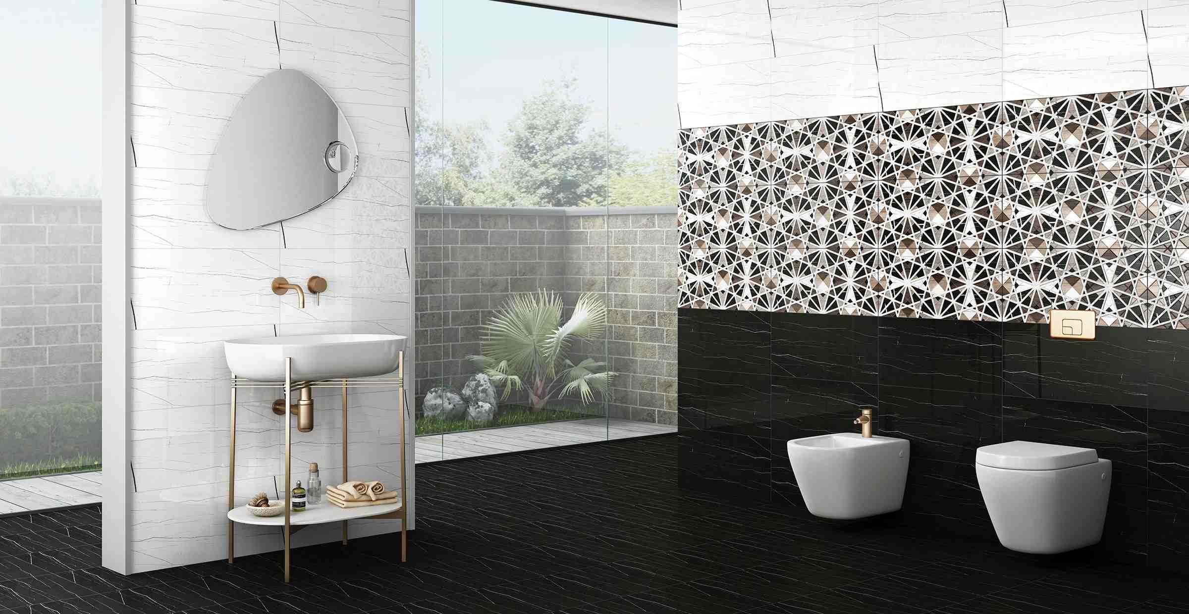 black floor tiles in a bathroom with mirror, toilet, washbasin