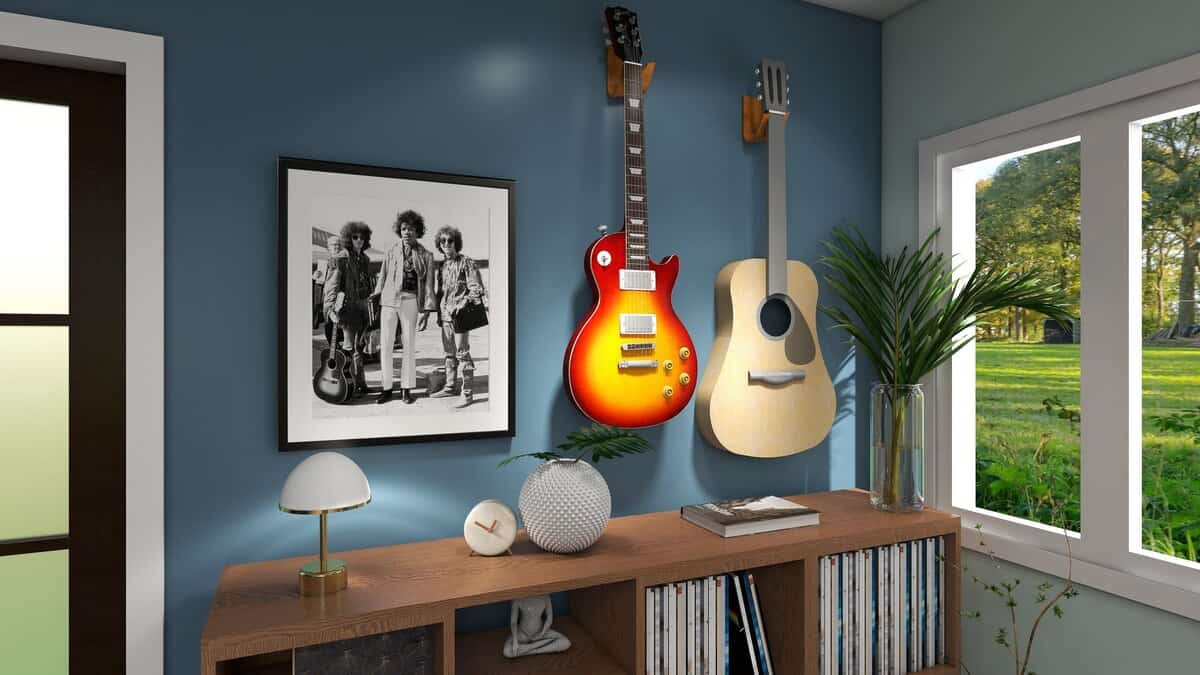 blue wall with guitars and a painting
