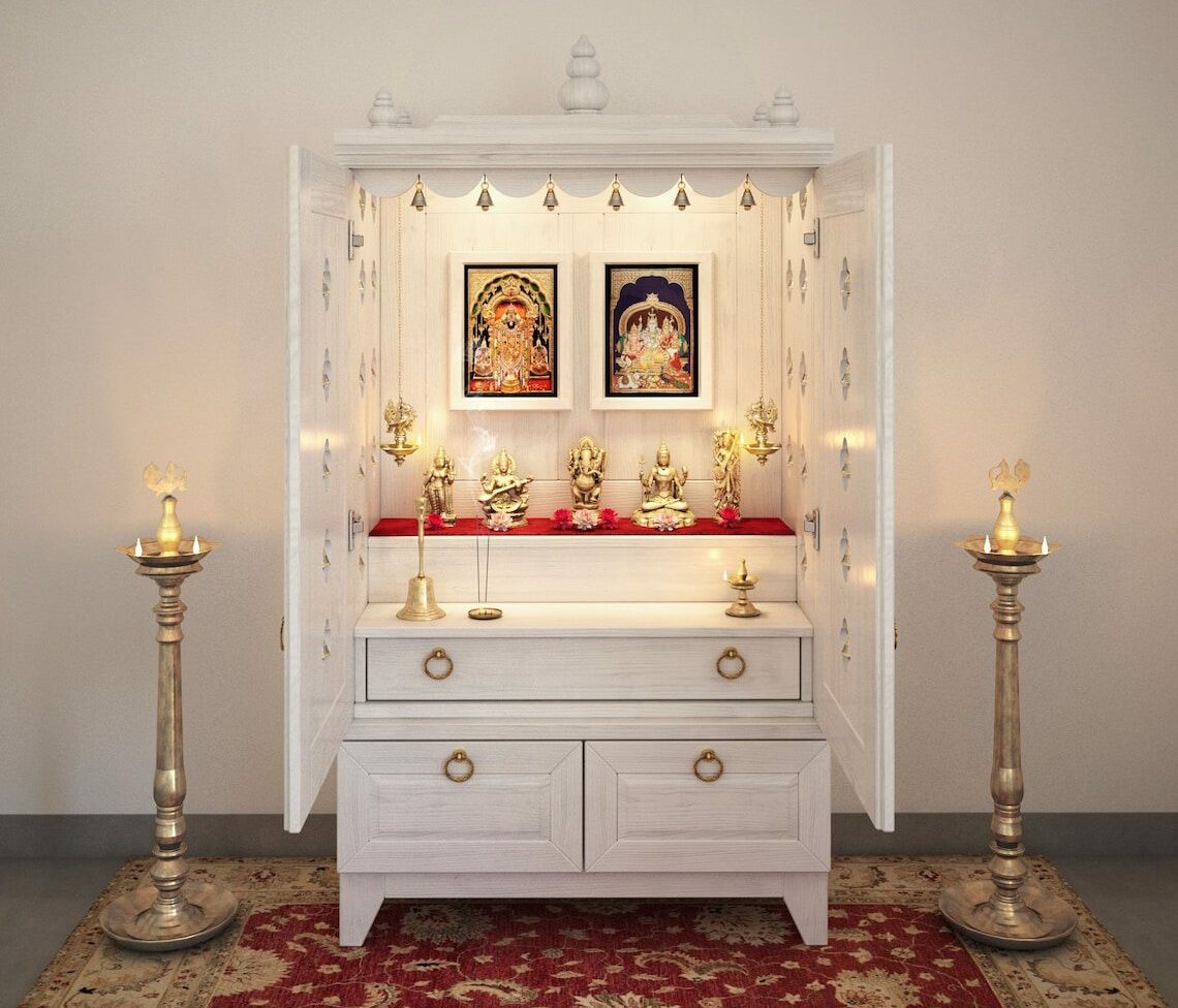 white prayer unit with idols, candles and storage