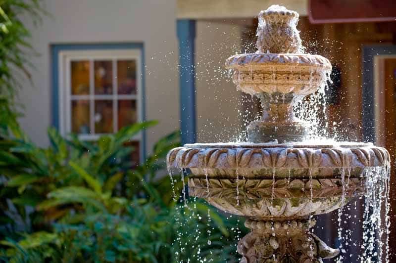 Garden fountain in front of yard