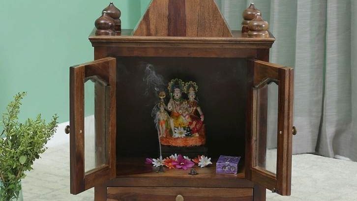 brown veneer prayer unit Stylish mandir design for living room wall for a modern home 