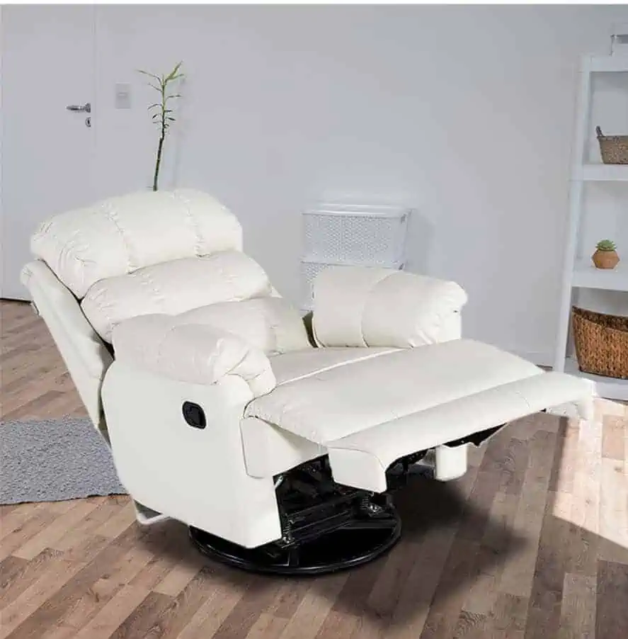white recliner in a living room with wooden flooring, white walls, house plant and white bookshelf