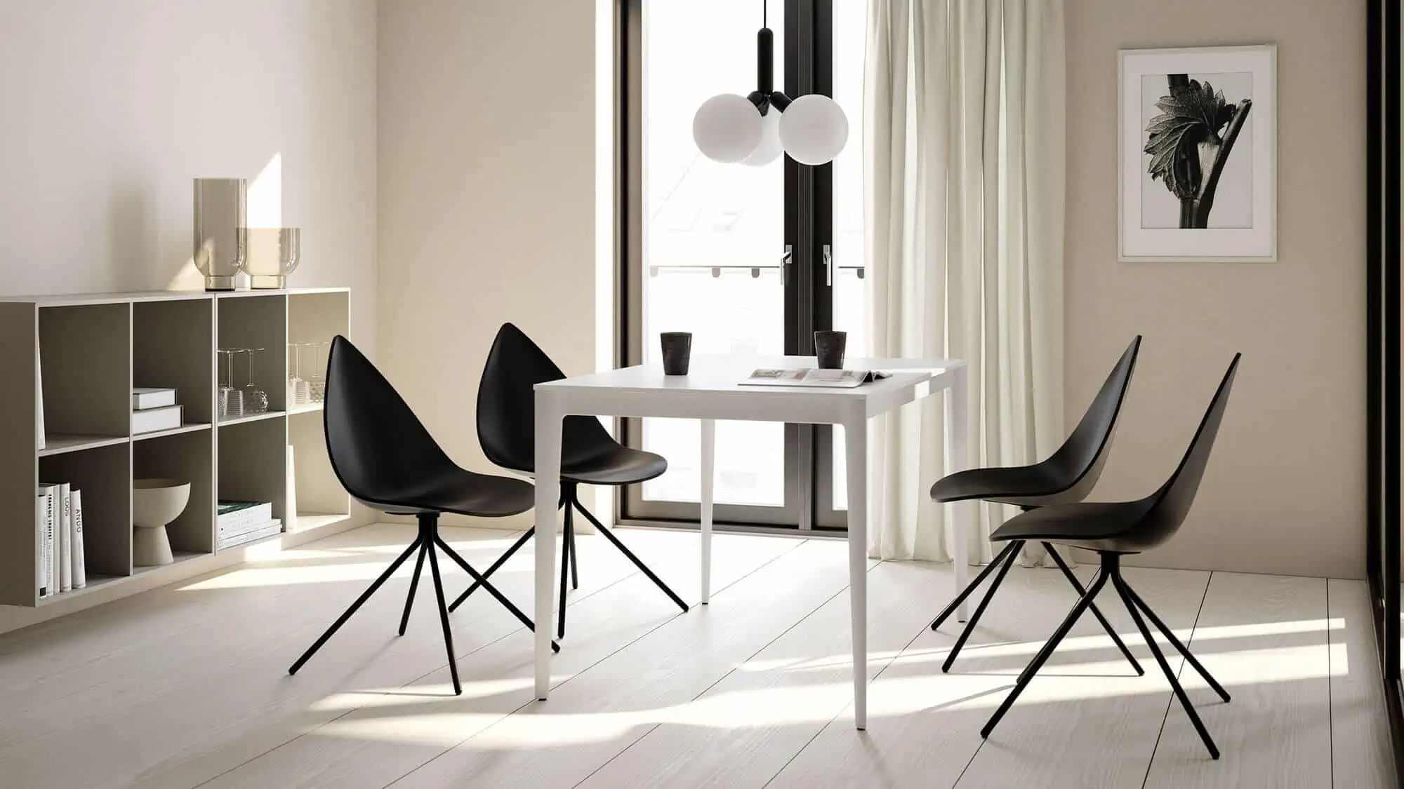 a dining room with black plastic chairs, bookshelf, lamp and wall painting in frame.