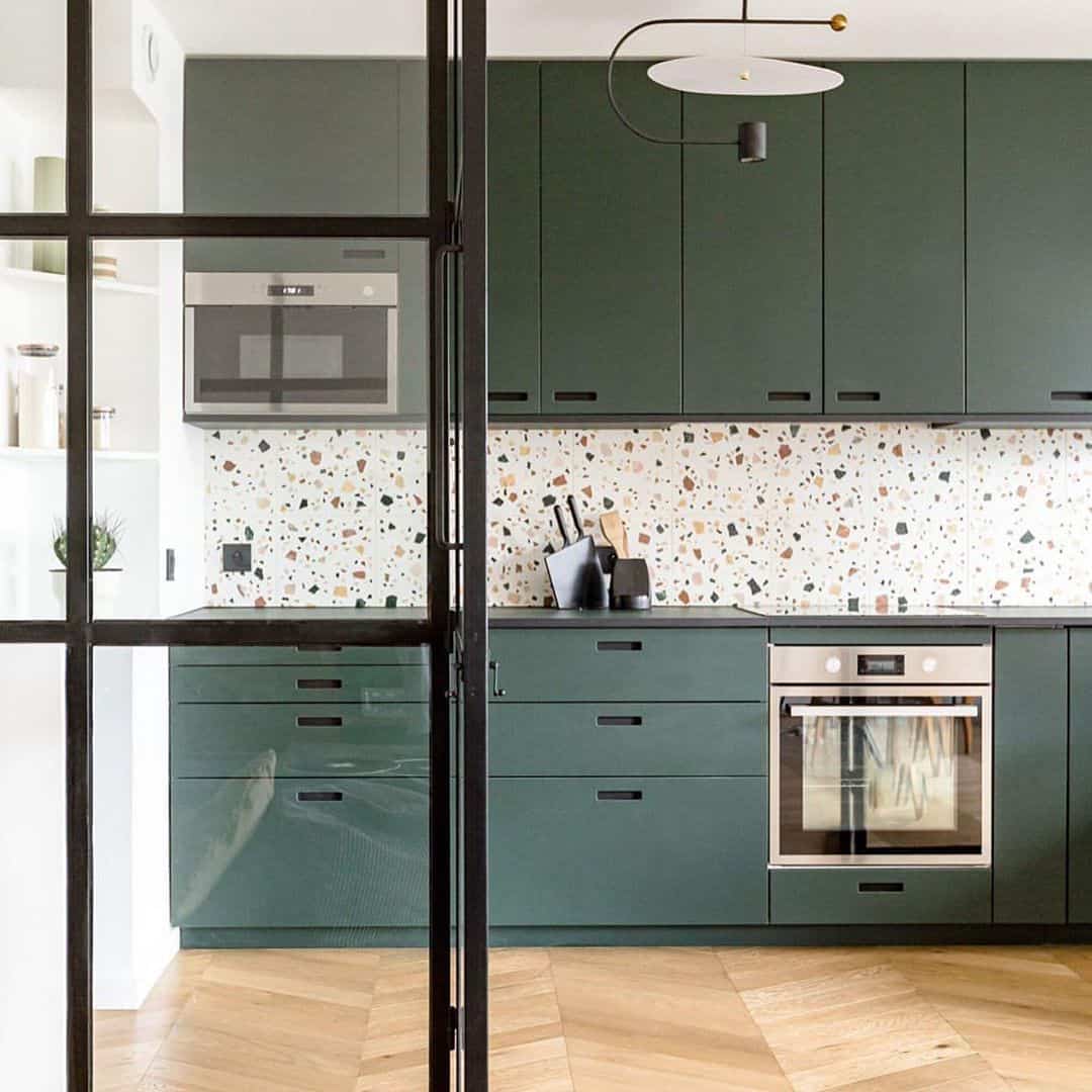 terrazzo tiles for kitchen walls with green cabinetry