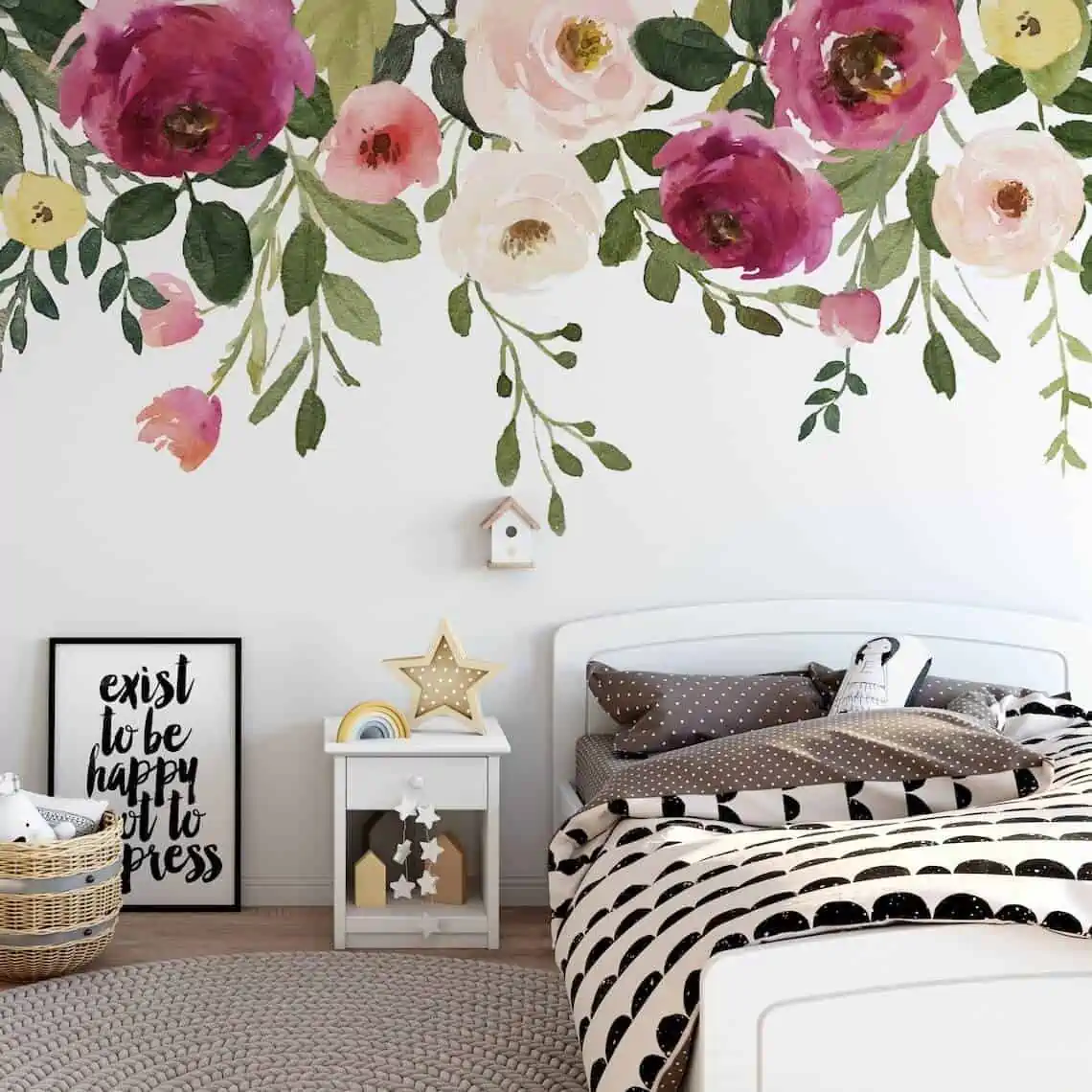 a modern bedroom with wooden flooring, white table and photo frame.