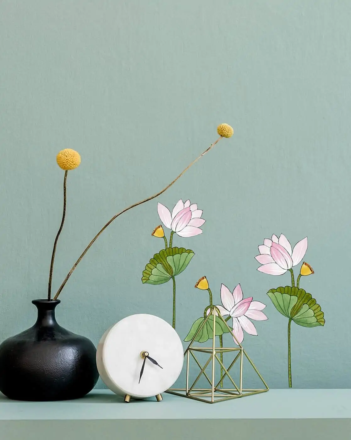 living room with a pot, a small clock and floral kitchen or living room wall sticker