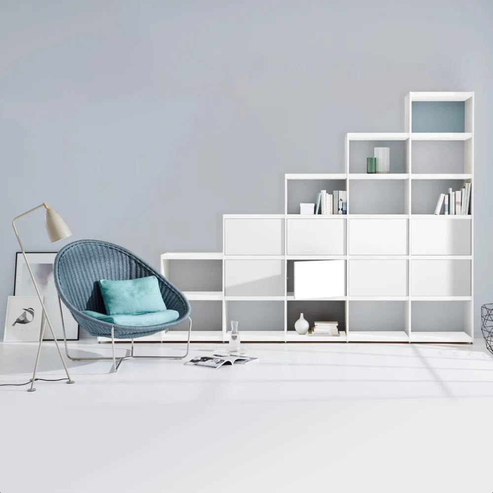 White modular bookrack with cabinets at the base for your hall