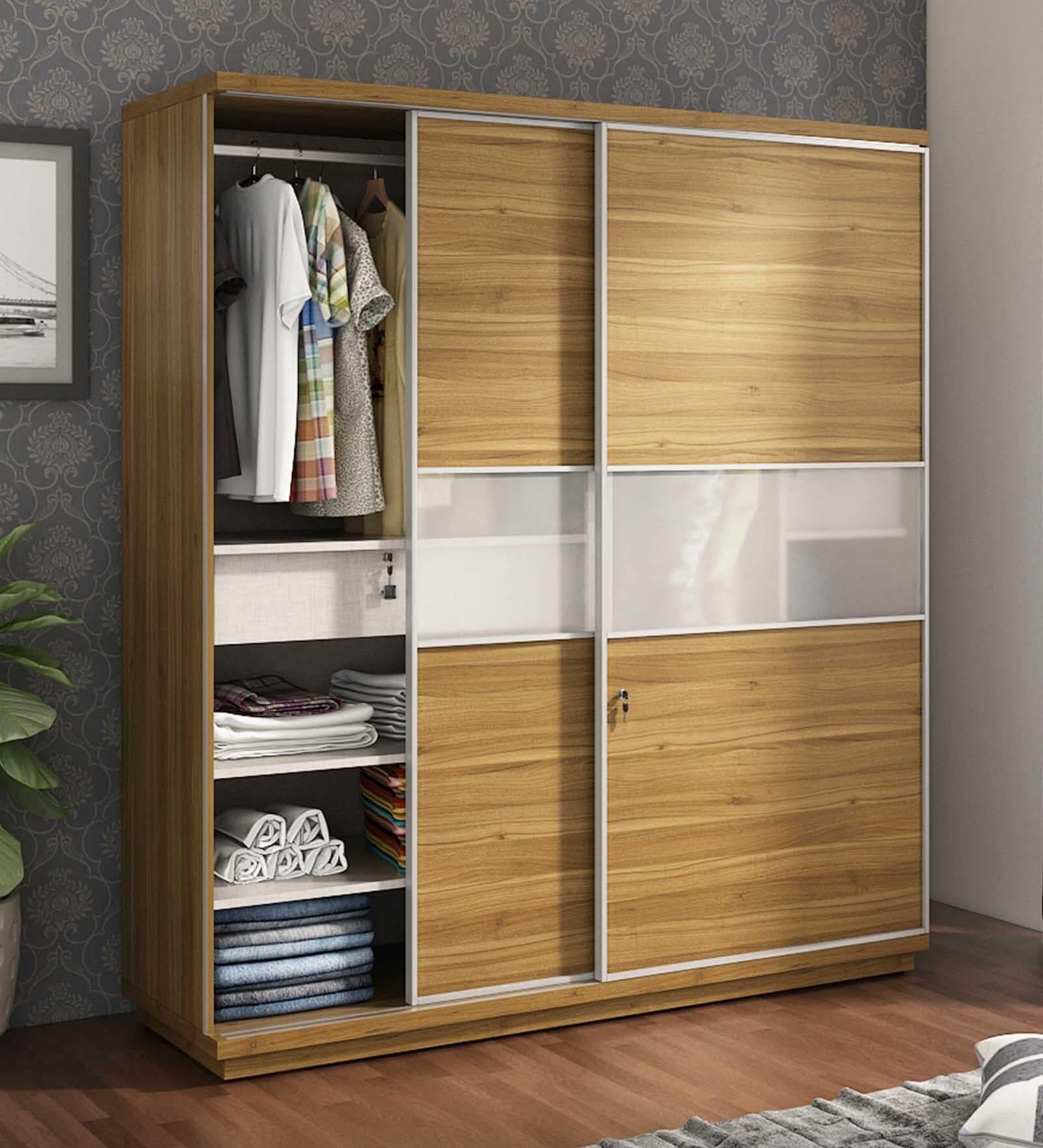 brown sliding door wardrobe in a bedroom