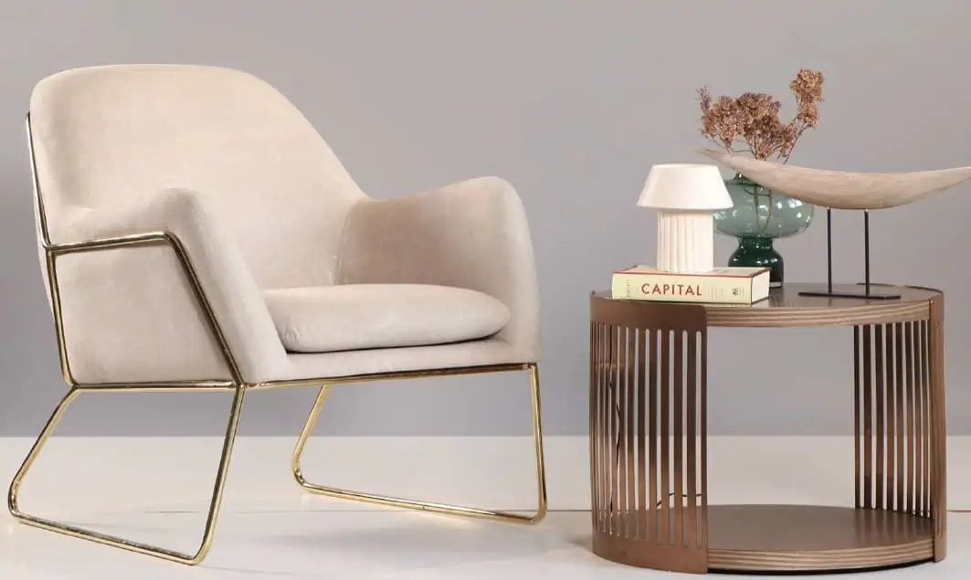 living room with beige colored furniture and metal stand.