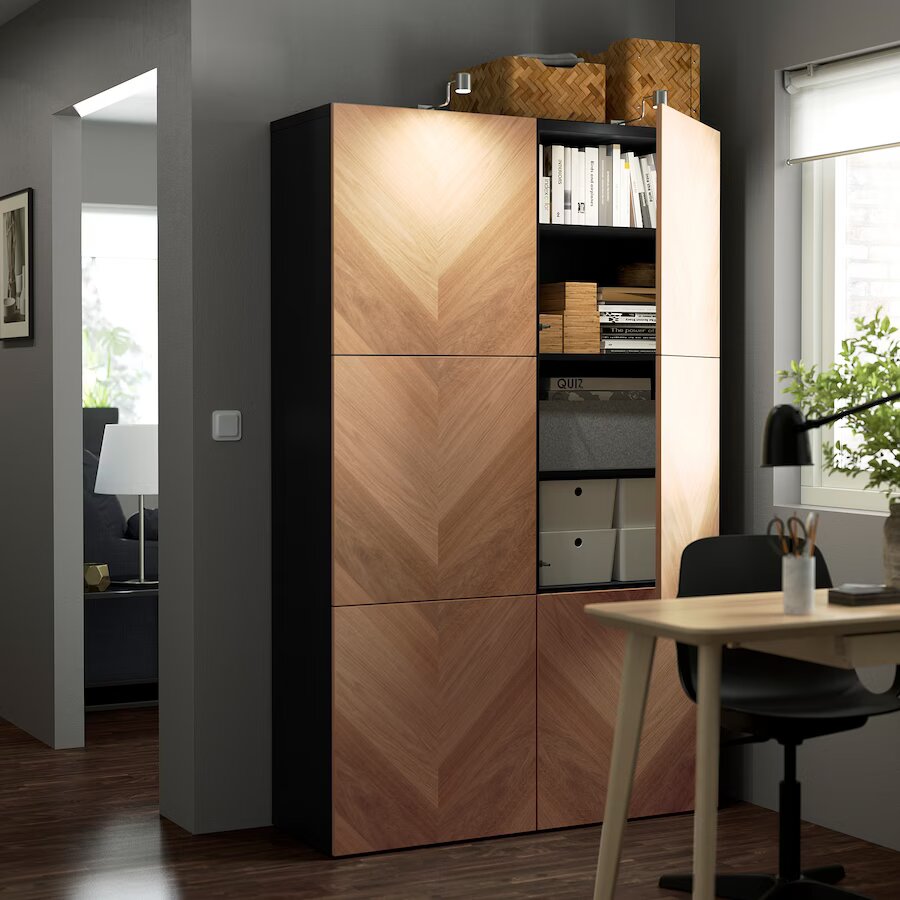 Black and brown textured closed bookshelf behind a study table for your living room