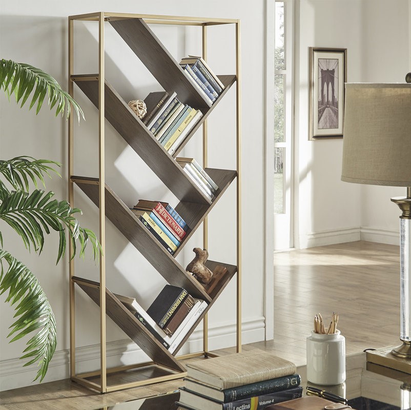 Golden metal bookcase with an angle in front of a study table for your drawing room
