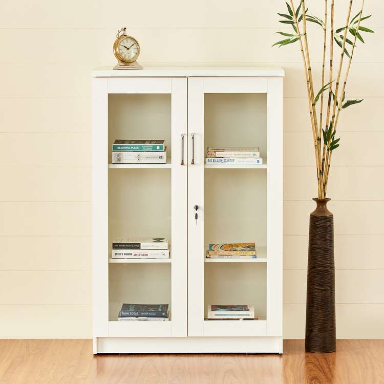 white cupboard with glass panels, indoor plant