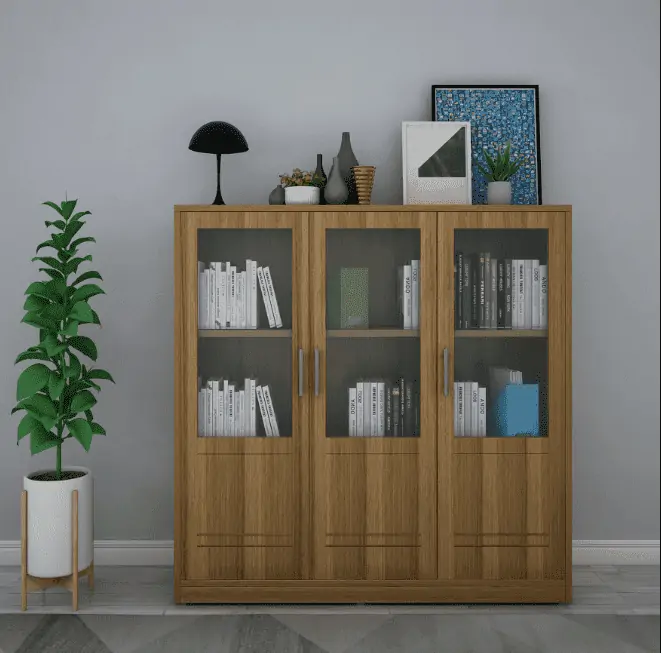 vintage light brown wooden cupboard in a room setting with indoor plant with side table for plant