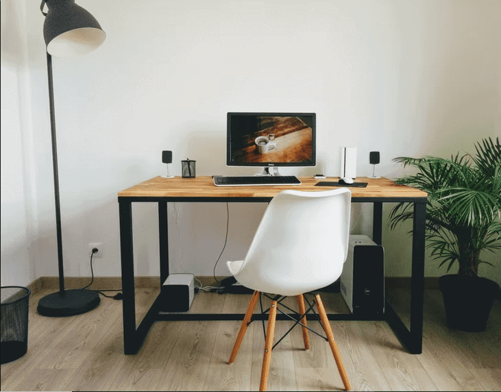 white chair, wooden legs, desktop table, black frame, wooden top