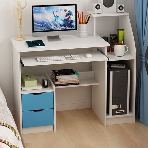 white computer table with desktop, room corner, blue drawers