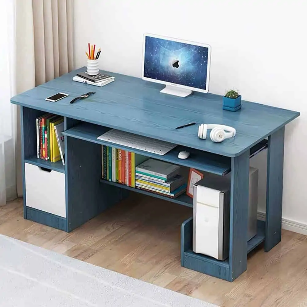 blue polished computer table with laptop, books, pen stand, room