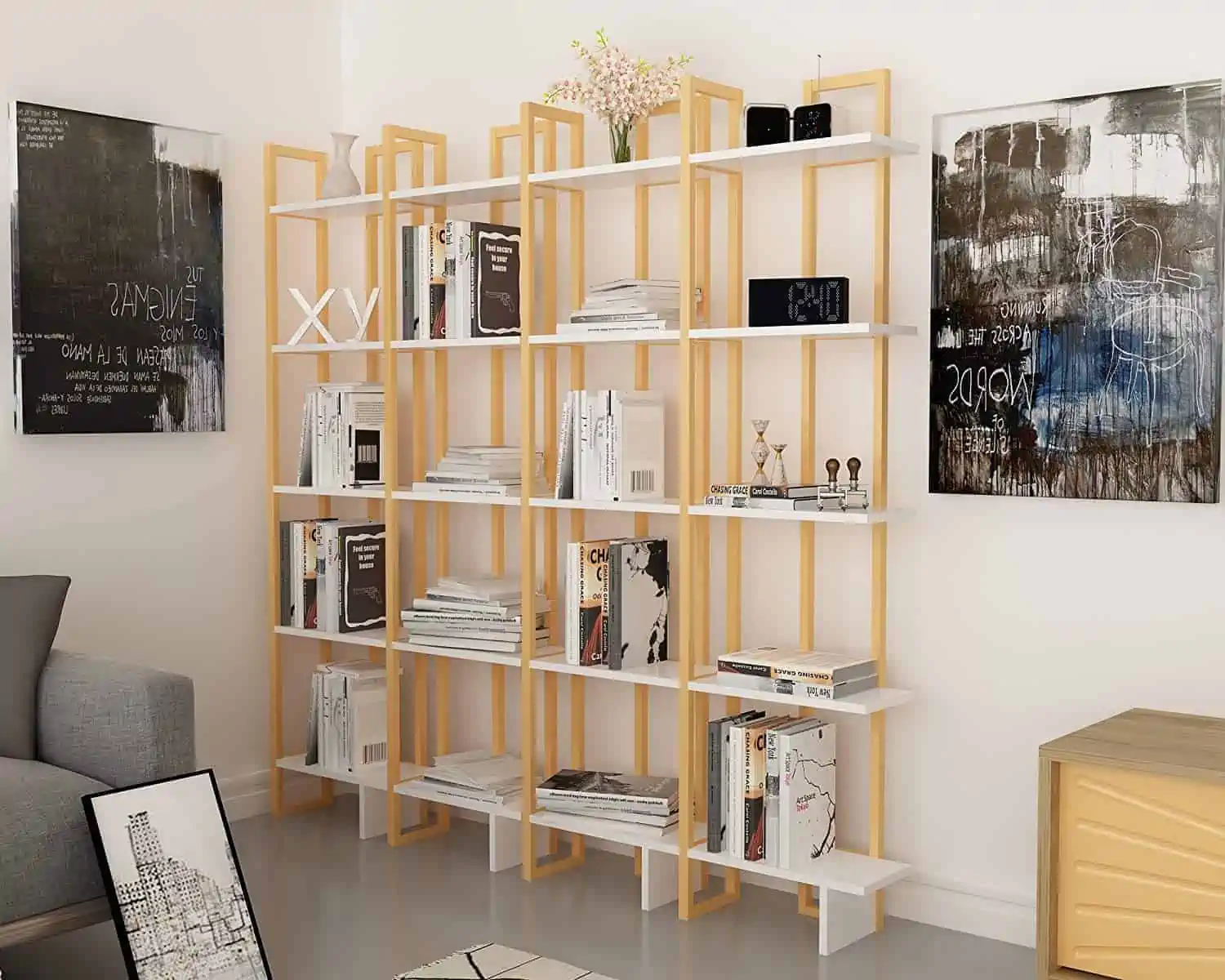 peach coloured corner bookshelf with articles and books in a room beside a study table