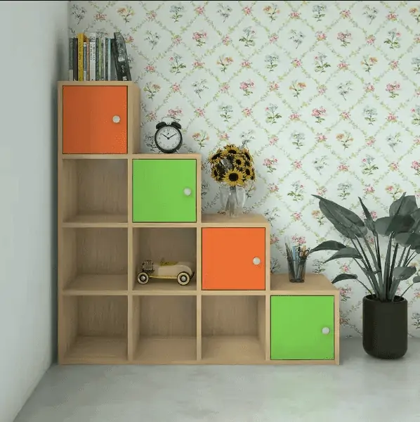 orange and green stair shaped cupboard in room corner