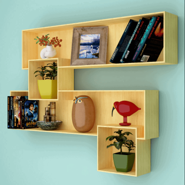 yellow wall mounted bookcase with showpieces and volumes
