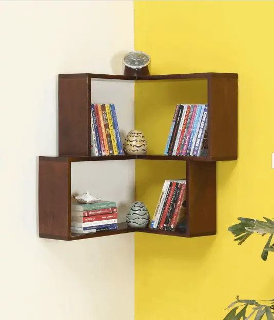 wooden box shaped dark brown corner bookshelf, two steps, with books