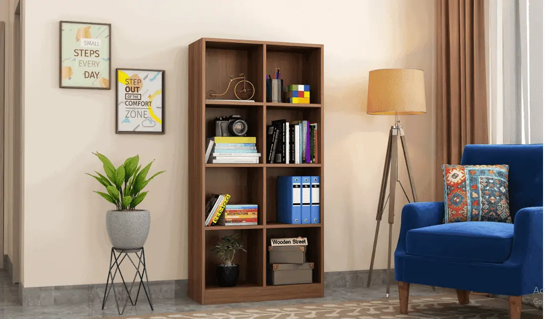 room setting, indoor plants, sofa, wooden brown bookshelf with books and articles