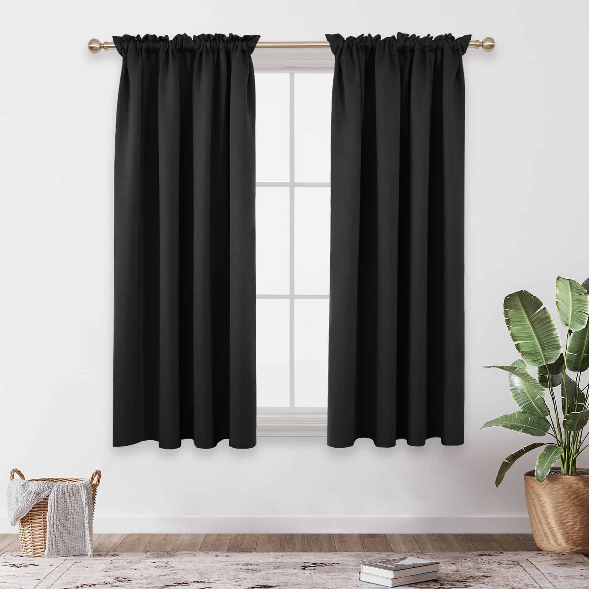 Black double panel drapes for living room window 
