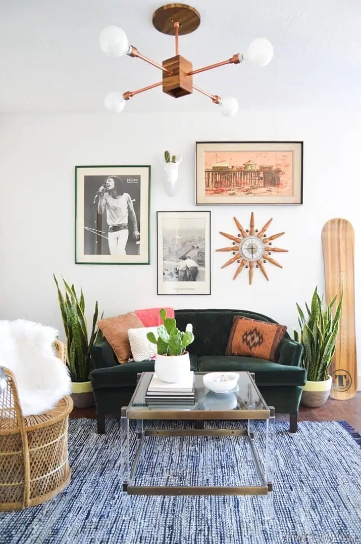 living room with sofa and wall paintings.