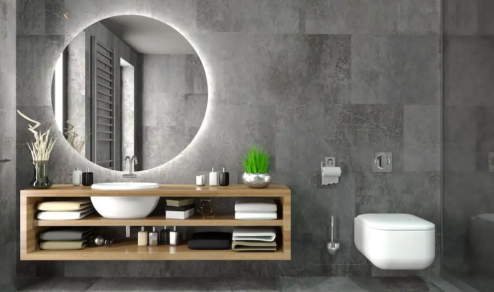 bathroom with a toilet and washbasin design with cabinet and a mirror in hall