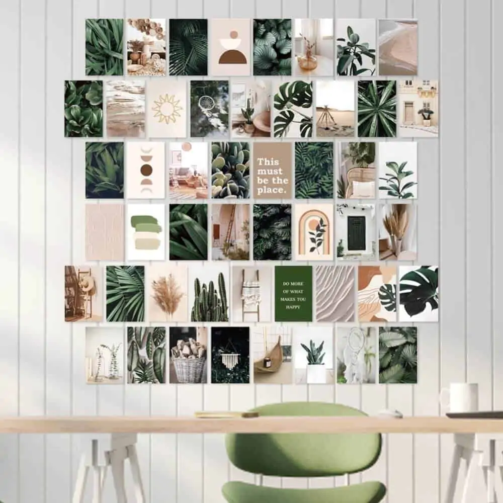 postcard collection on a white wall with light brown table and green chair