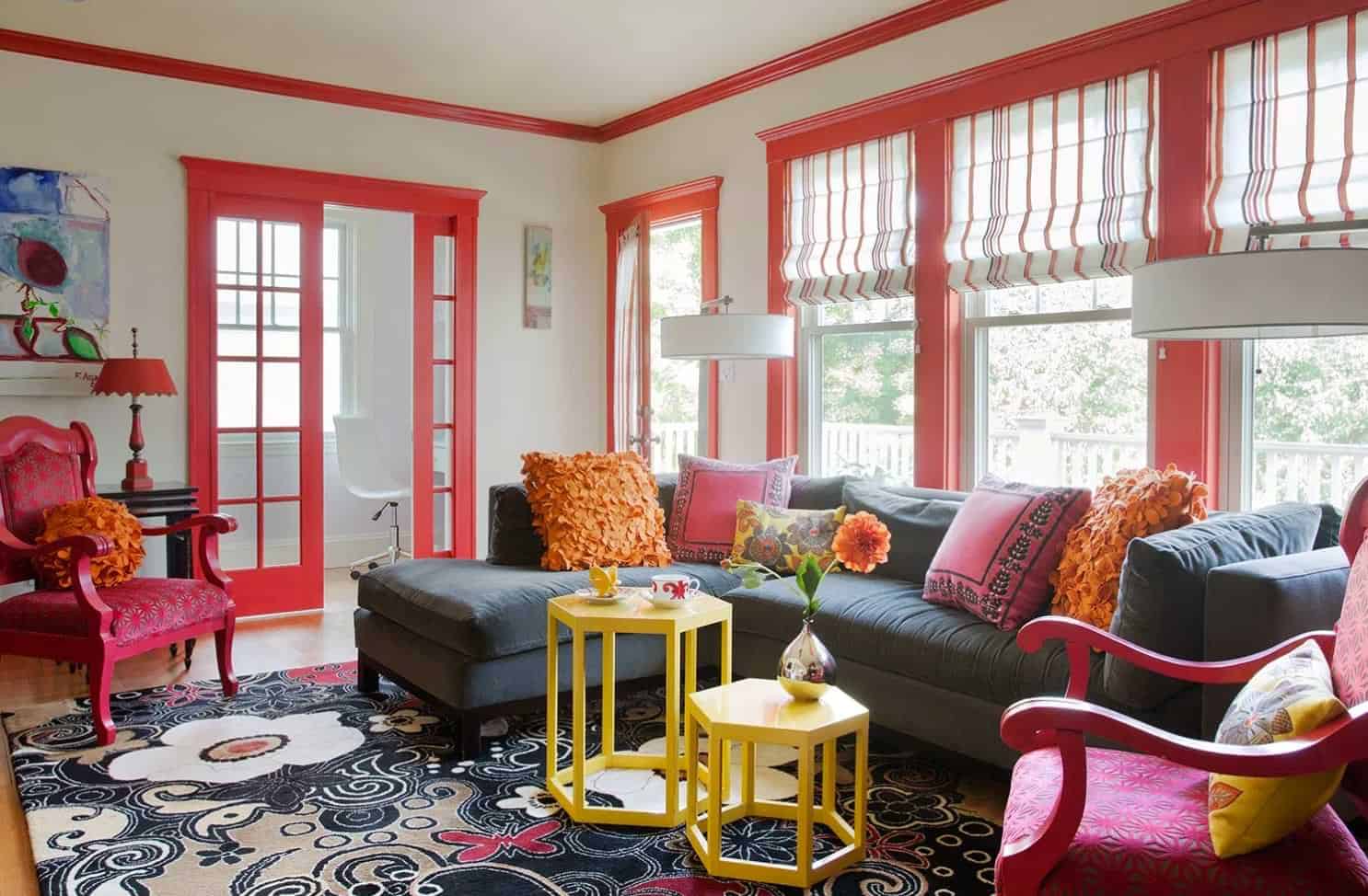 beautiful living room with bright orange colour accents and furniture