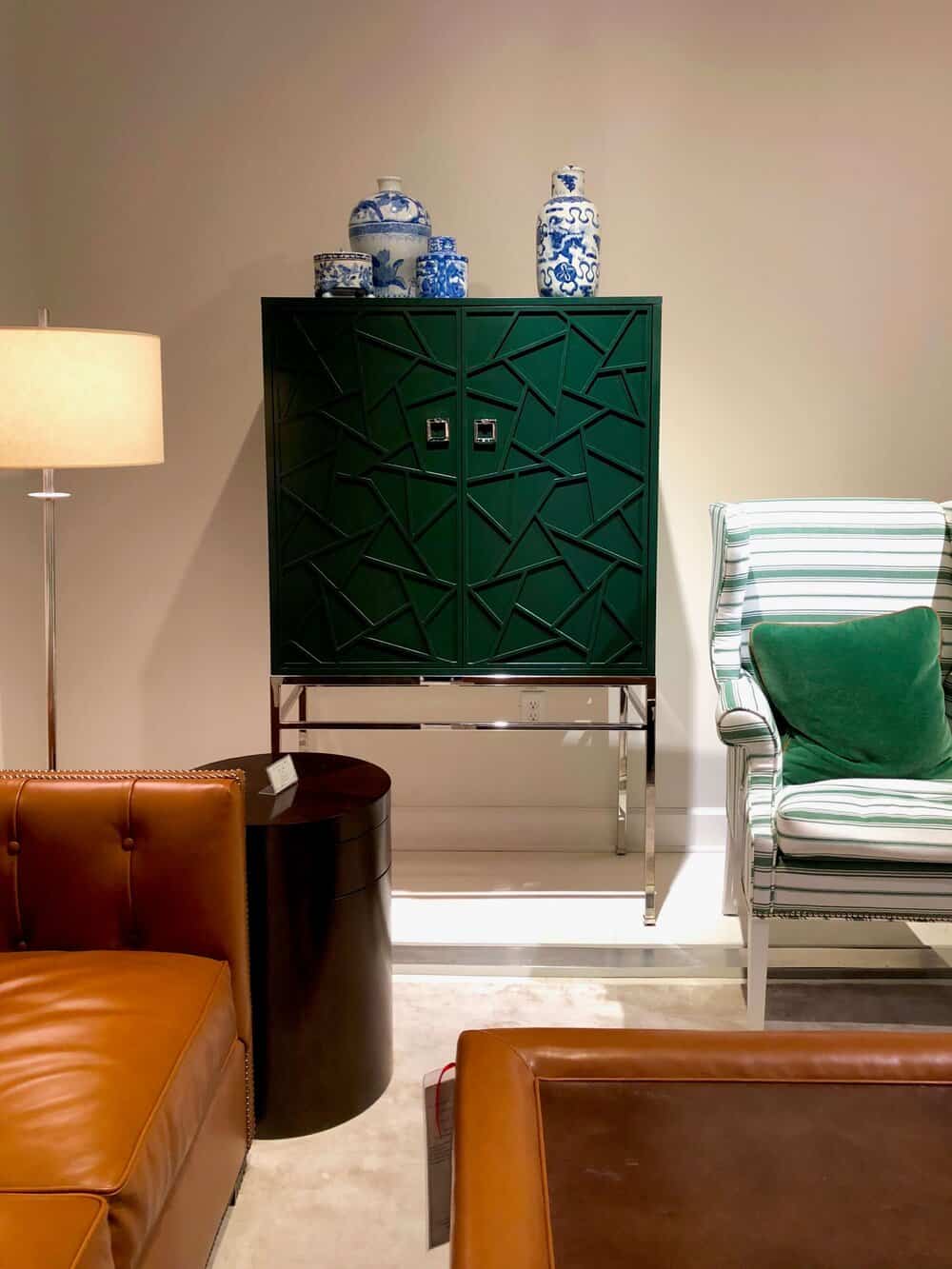 A statement emerald green cabinet for display