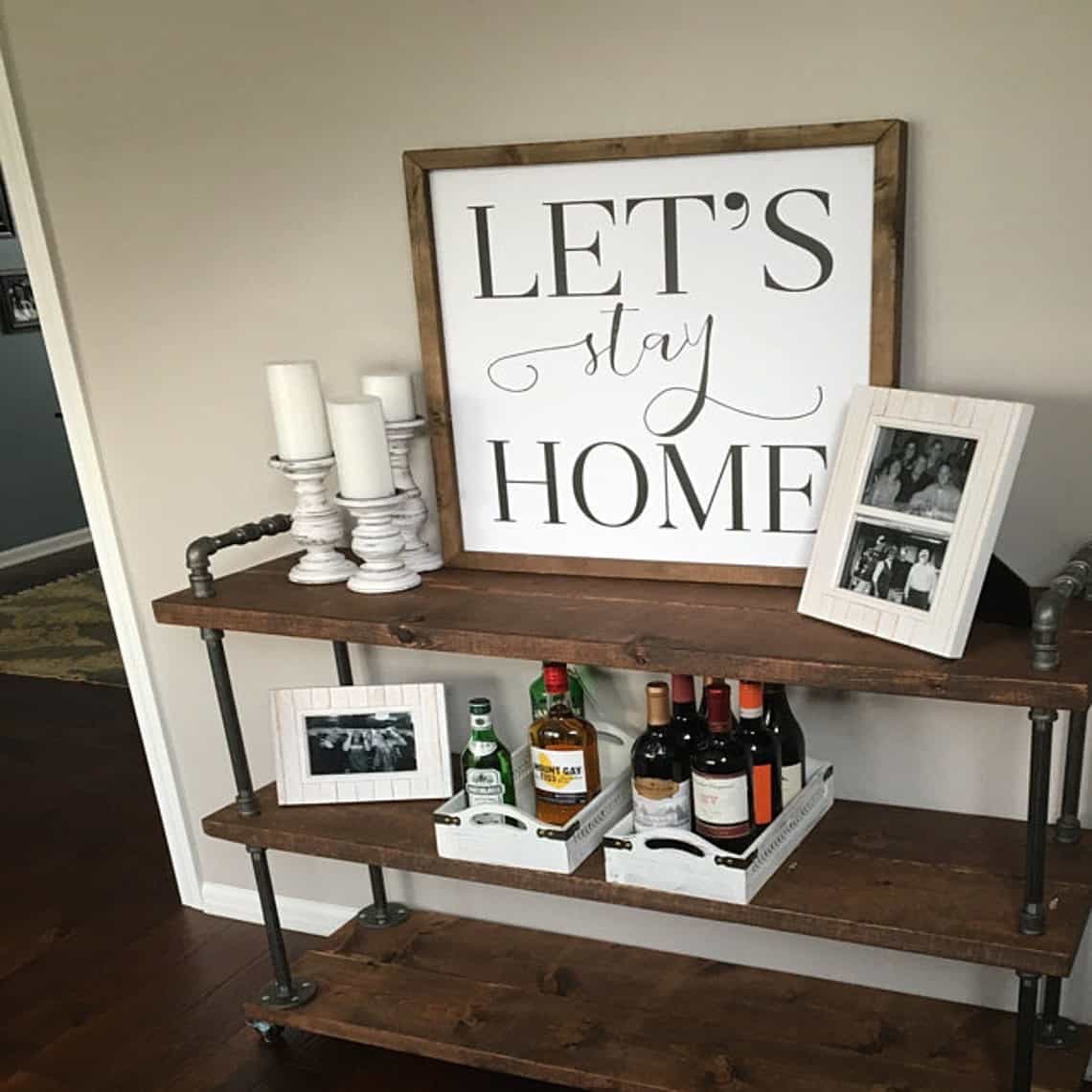 Dark brown bar cart with stay home sign