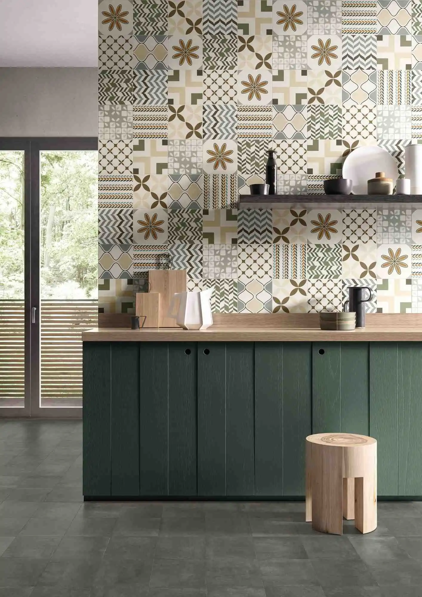 patterned kitchen tiles with green cabinets and floating shelves