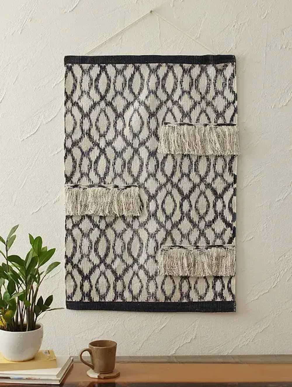 Wall tapestry with indie print and tassles