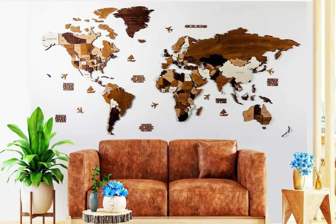 brown world map with a potted plant and a brown sofa