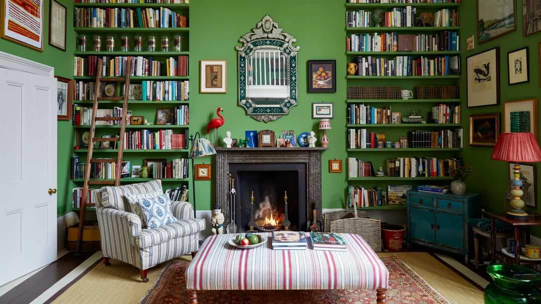 green colour vintage inspired living area with library wall and ladder