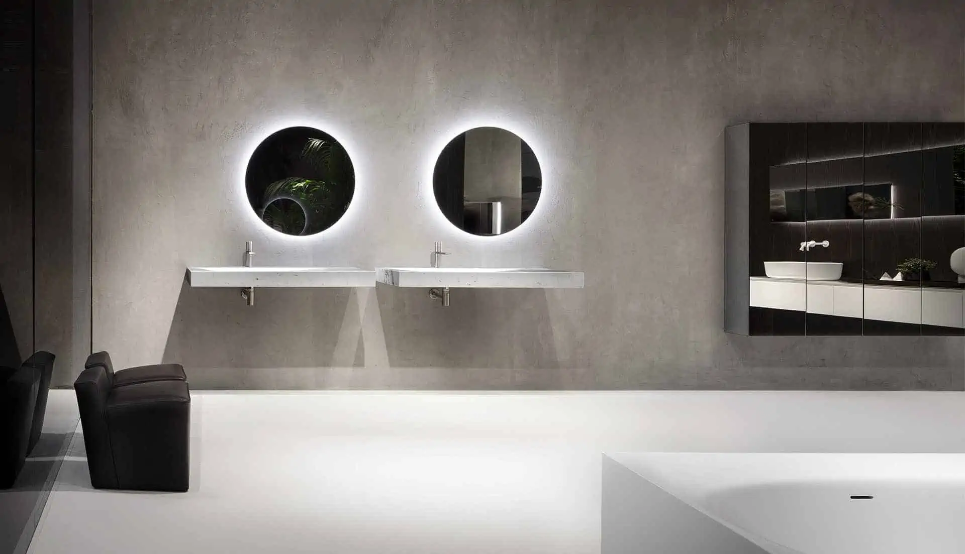 washbasin with white walls and twin mirrors