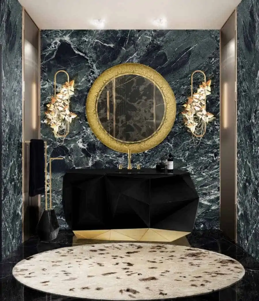 golden metallic mirror in a bathroom with lamps