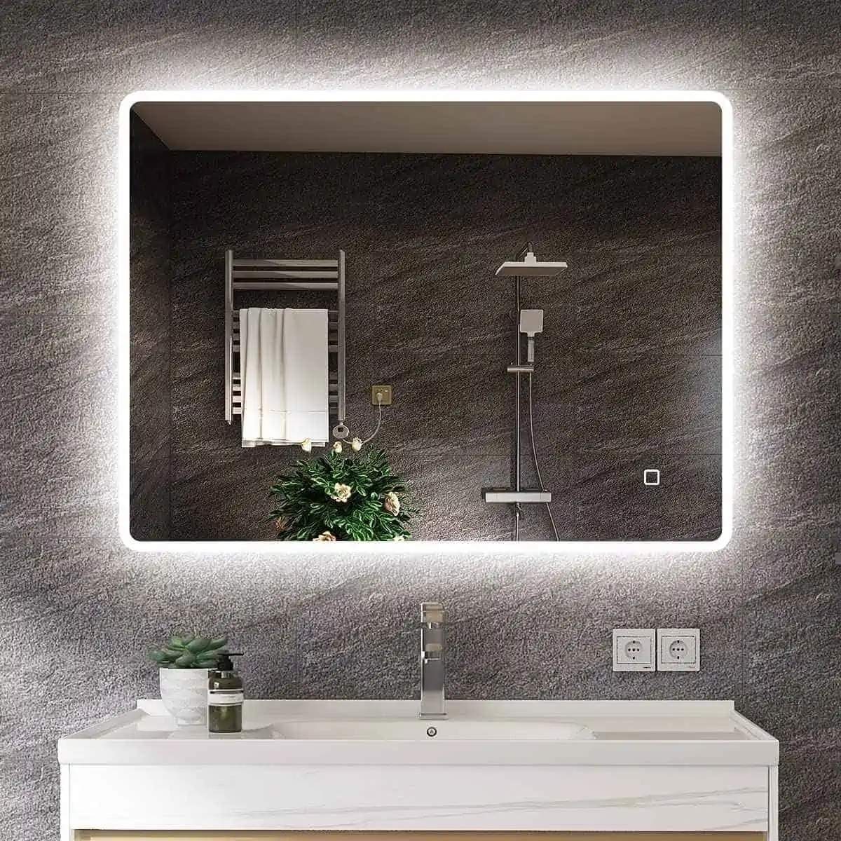bathroom with a large mirror strip lights and white washbasin