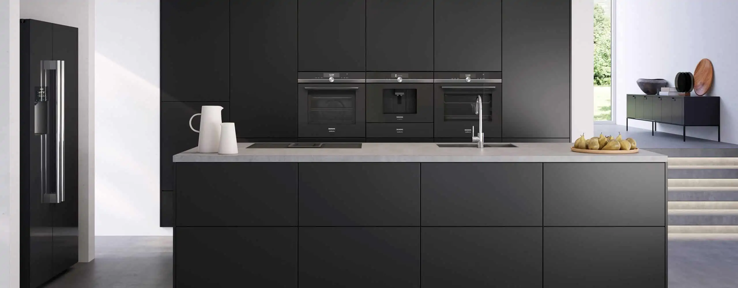 https://buildingandinteriors.com/wp-content/uploads/2022/06/Modern-kitchen-with-built-in-appliances-by-Siemens-scaled.webp