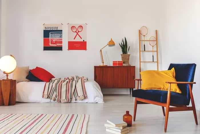 Triadic colour scheme bedroom with striped rug