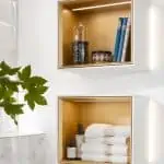 white coloured wall-mounted bathroom shelf