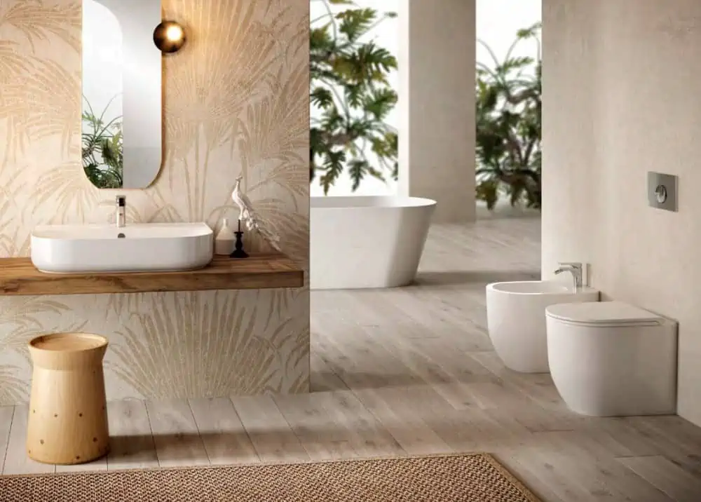 minimalistic washbasin with a mirror, stool and a toilet with a light brown wall