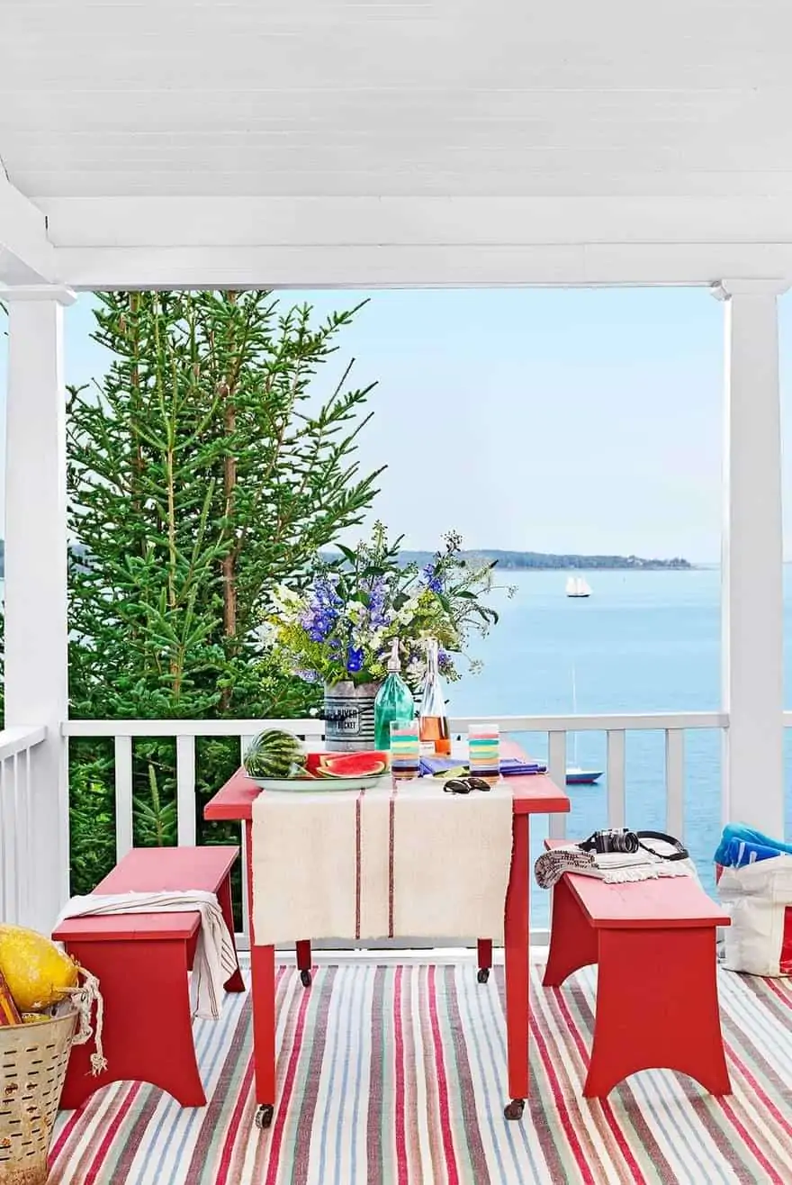 read benches and striped rug in red