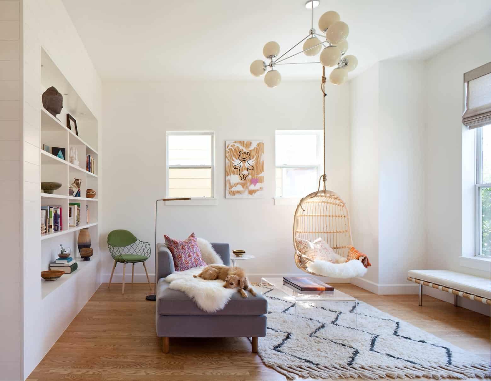 white colour room with hanging cane chair